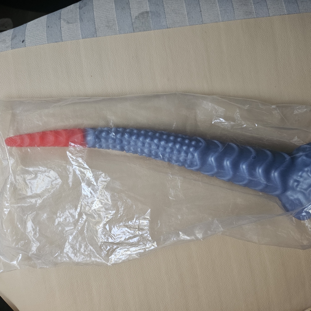 Blue and Red Textured Toy